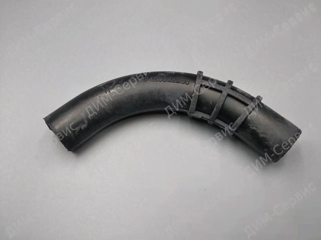 076233 Патрубок Ariston Indesit ( от насоса к трубе верх. импеллера)-0
